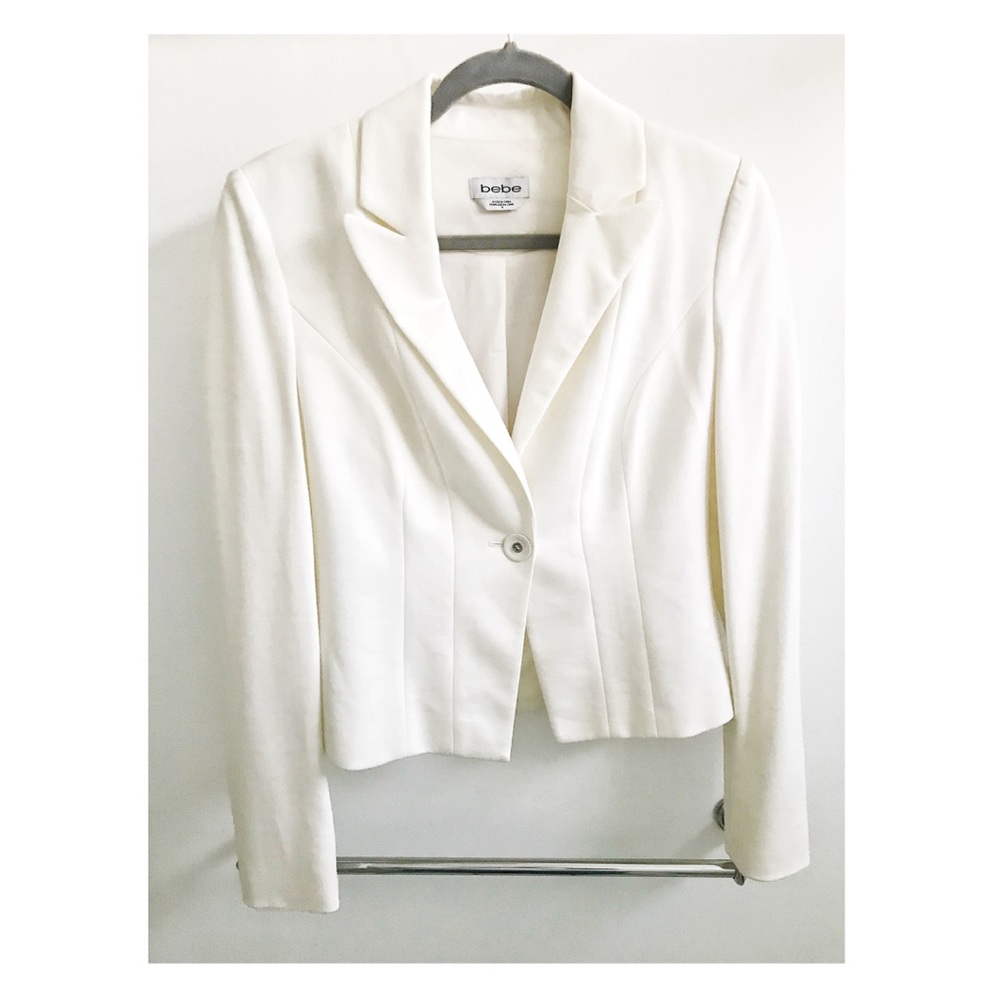 White bebe Blazer with design in back